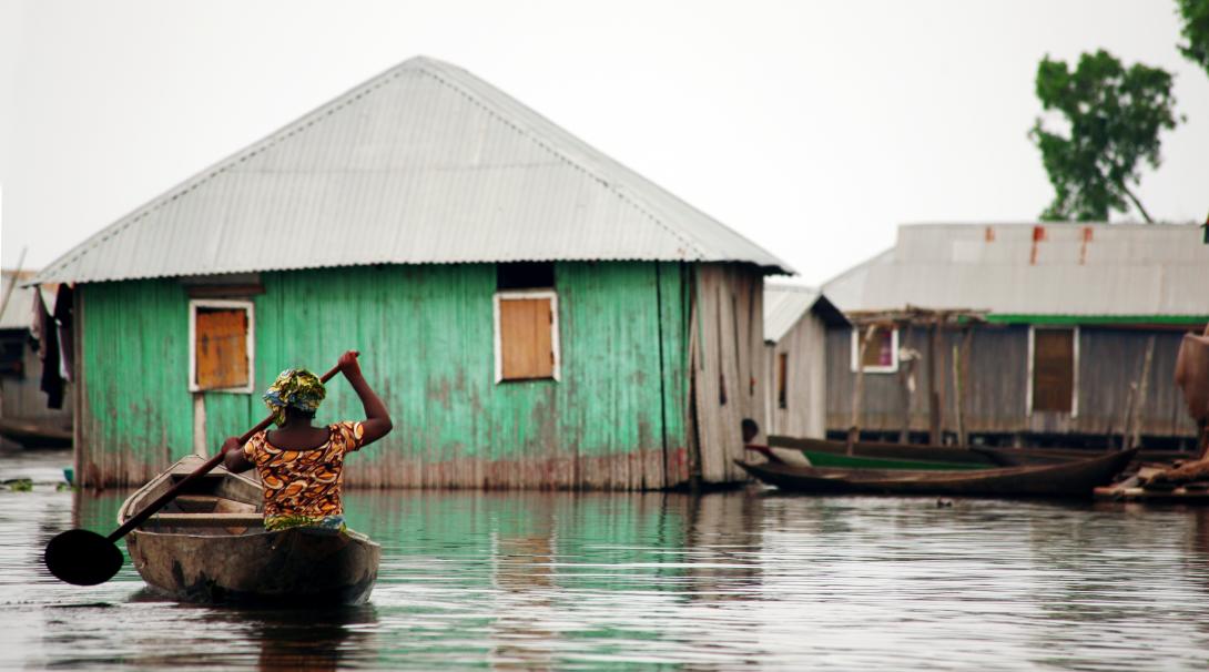 A woman is on her way to her home after the floods caused by cyclone Idai in Mozambique. Projects Abroad volunteers can help local communities in Mozambique at the disaster relief project set up after cyclone Idai.